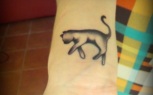 Tatuajes minimalistas de gatos